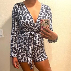 Navy blue and white, printed romper.